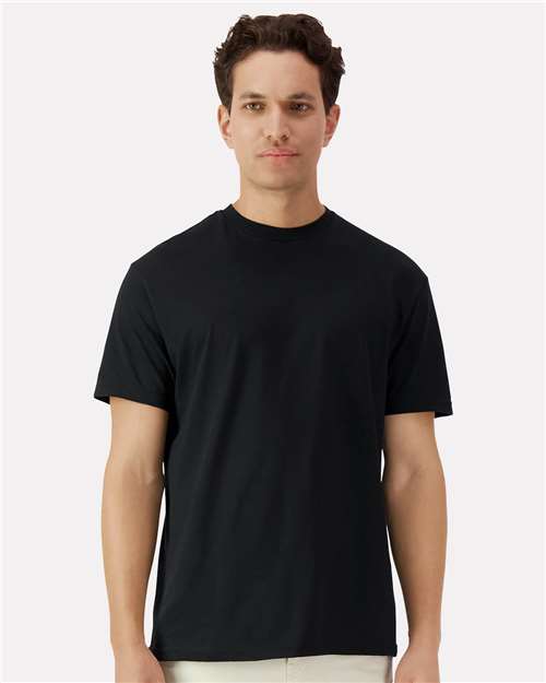 Man wearing a black t-shirt against a white background