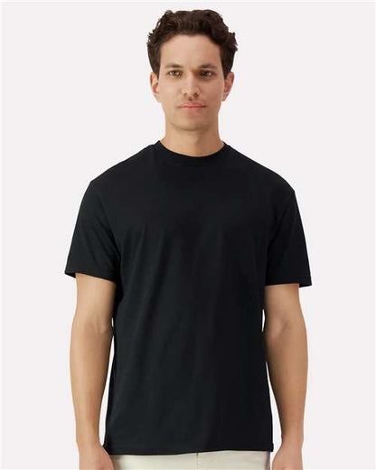 Man wearing a black t-shirt against a white background